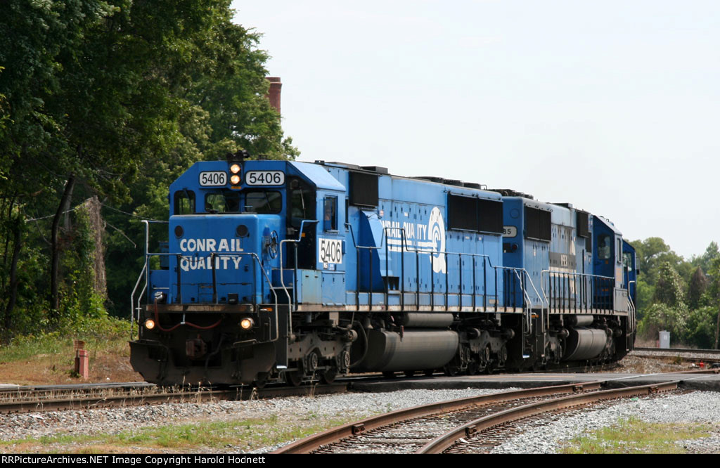NS 5406 leads two other SD50's westbound